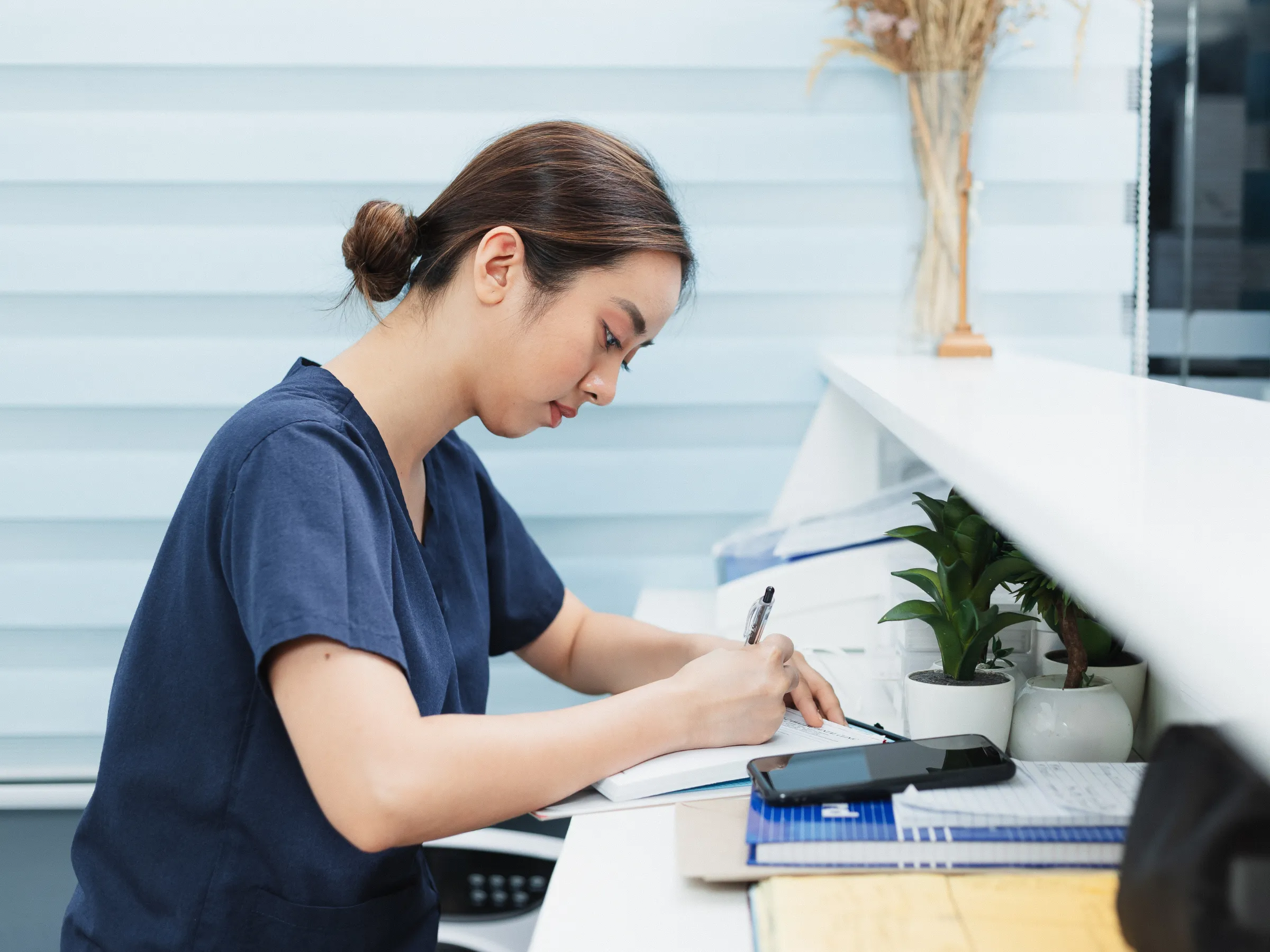 Nurse working at station