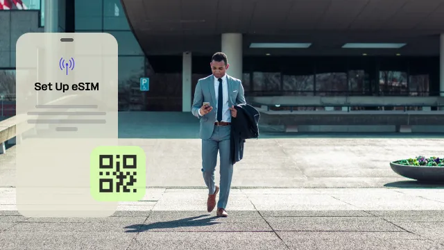 Business person with mobile phone and eSIM 